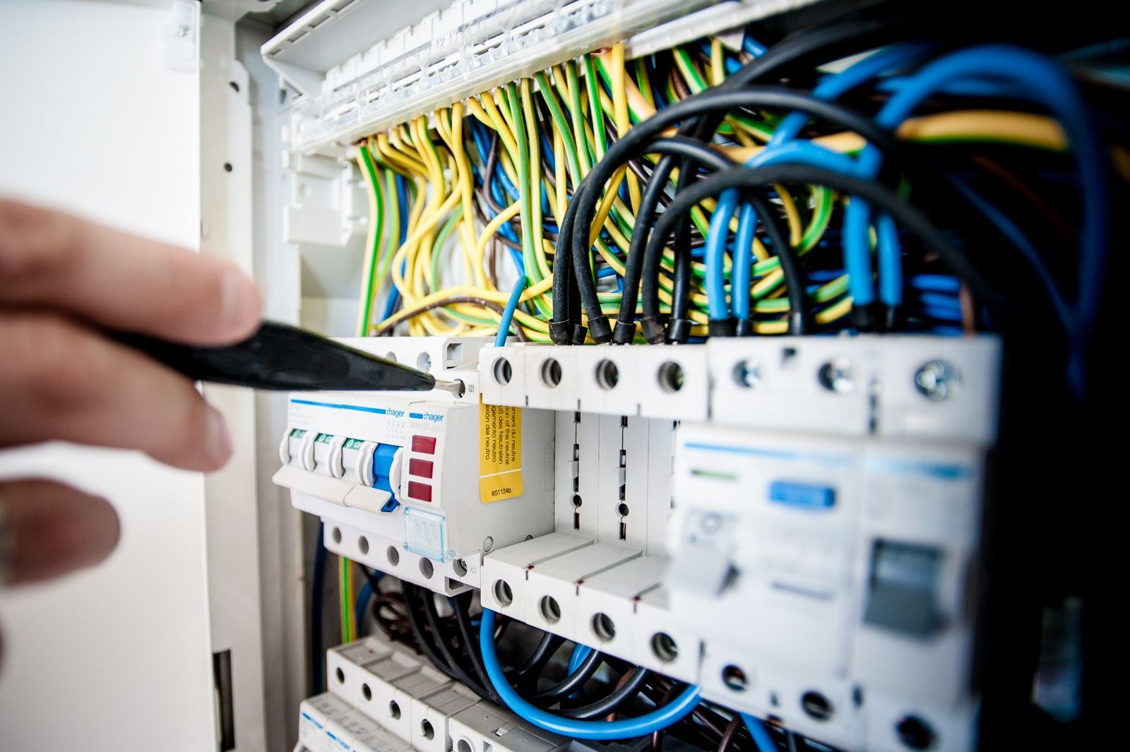 An electrician at work — electrical businesses are one of Northline's specialties